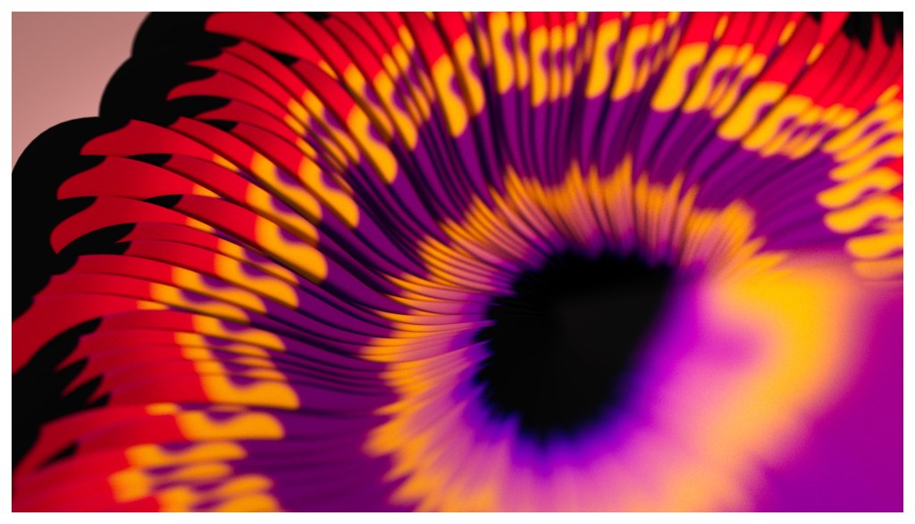 Close-up image of a colorful, swirling pattern featuring vibrant red, purple, and yellow hues, creating a sense of motion and depth.