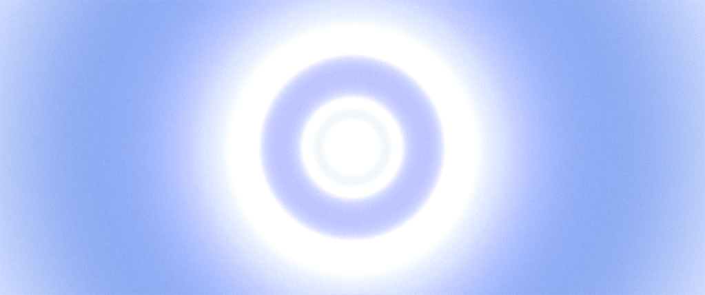 A gradient image featuring concentric circles of blue and white light, creating a soft glowing effect.