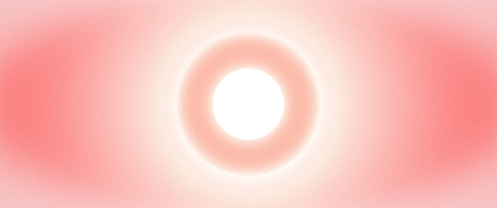 A soft, glowing orb with a bright white center surrounded by a gradient of light red hues, creating an ethereal effect.